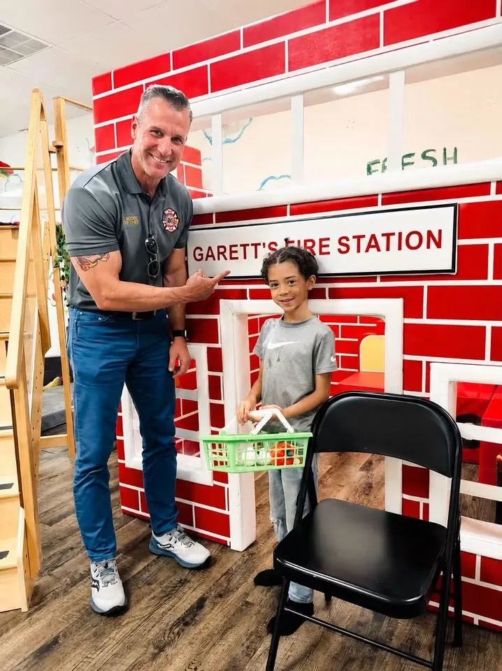 Community moment at the Fresh Play Cafe pretend fire station